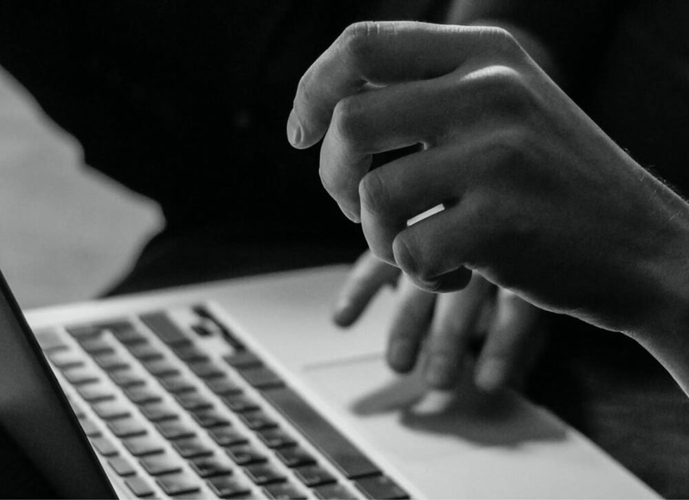 Graphic designer sketching a brand logo Web Design and Digital Marketing Agency in Richmond Texas